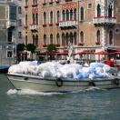 The laundry boat - everything travels by water Photo - Venice, Italy 